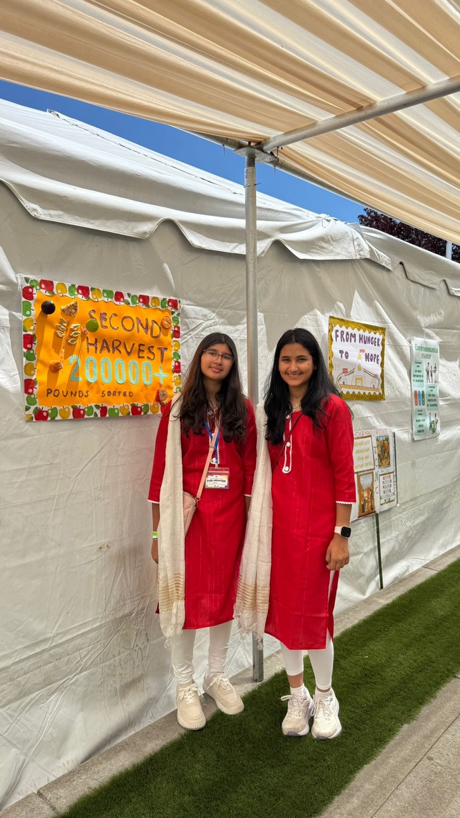 Khushi volunteering at a Second Harvest service event